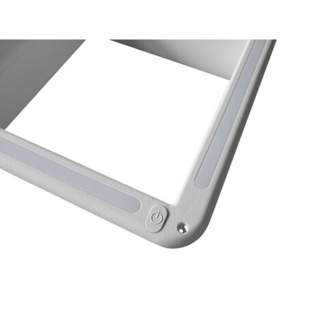 A close up of a white box with a TRA LED light Garnish with built in Switch on it.