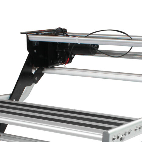 A Double 12v Electric Caravan Step with LED Light with a metal rail on top of it.
